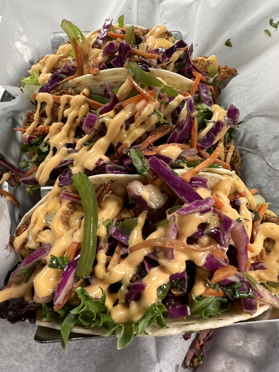 Colorful slaw tacos prepared by Gaetano Mazza
